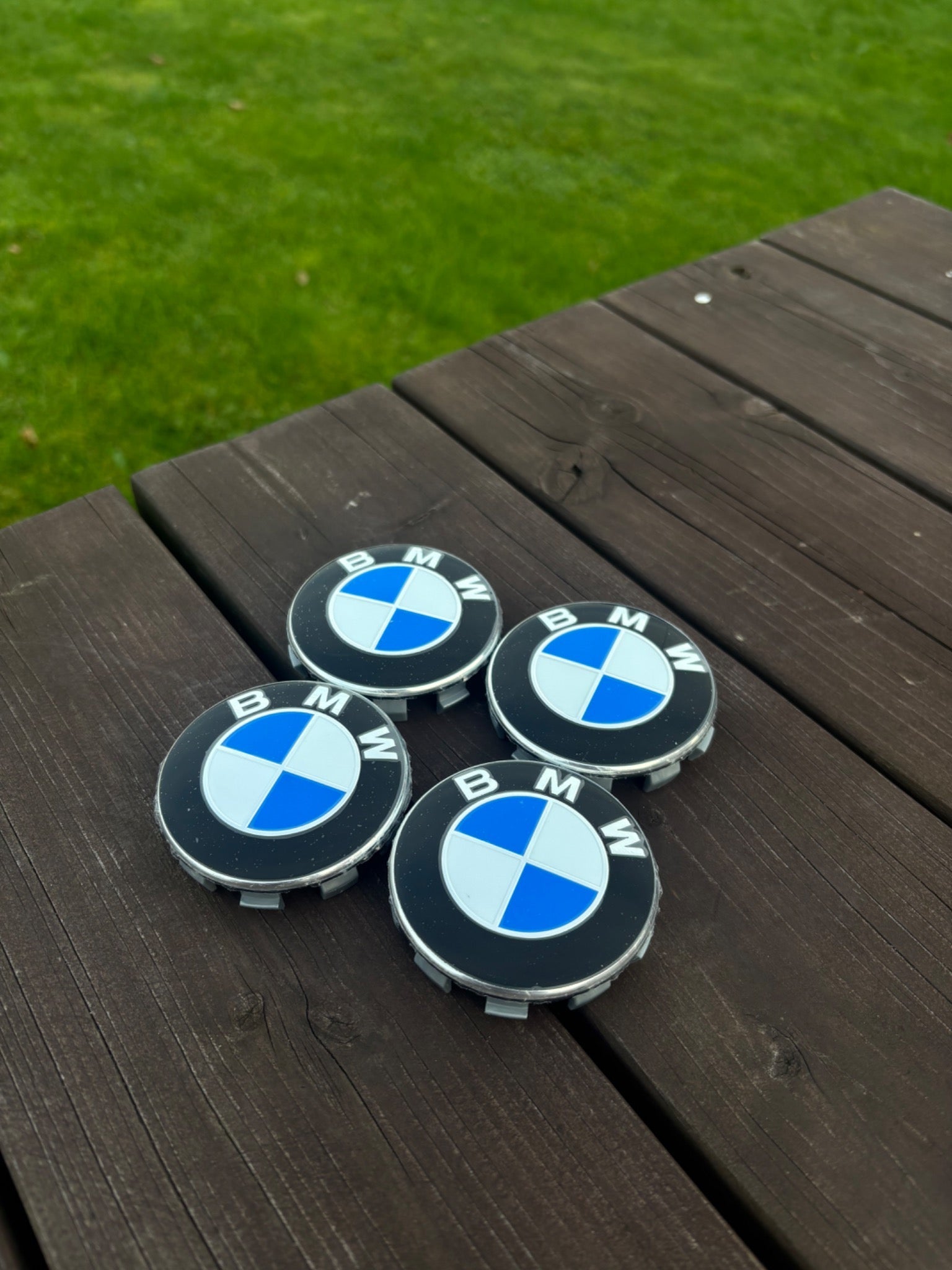 Set of four BMW wheel centre caps